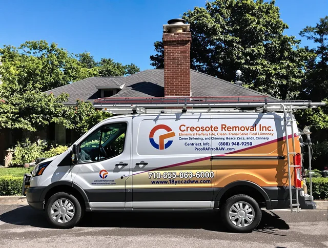 Berea Chimney Sweep technician removing creosote safely in Berea, OH